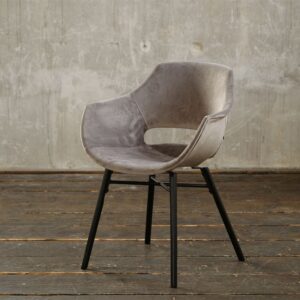 Der Polsterstuhl ZAJA kombiniert modernen Stil mit hohem Sitzkomfort. Dieser Esszimmerstuhl mit Samtbezug ist eine Bereicherung für jeden Raum. Das elegante Design fügt sich nahtlos in unterschiedl...