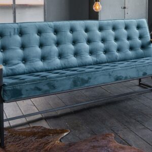 Die KAWOLA Polsterbank ARLY wirkt durch ihr elegantes Metallgestell eher minimalistisch. Das Gestell setzt sich aus einigen rechteckigen Formen zusammen und ist mattschwarz lackiert. Trotz der gera...