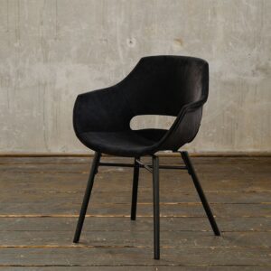 Der Polsterstuhl ZAJA kombiniert modernen Stil mit hohem Sitzkomfort. Dieser Esszimmerstuhl mit Samtbezug ist eine Bereicherung für jeden Raum. Das elegante Design fügt sich nahtlos in unterschiedl...