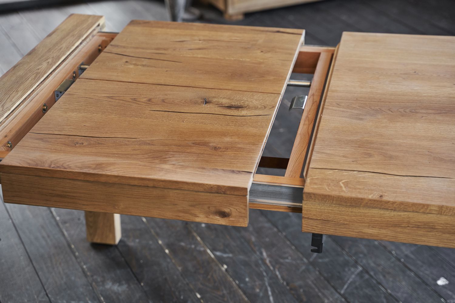 dass die Tischplatte erweitert werden kann - je nach Var...