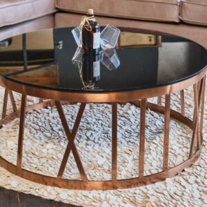 Der KAWOLA Couchtisch MELLA ist mit seinem modernen und eleganten Design ein Eyecatcher in jedem Zuhause. Die schwarze Platte aus Glas ist sehr hochwertig verarbeitet