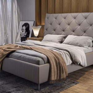 Das KAWOLA Polsterbett ANNY ist eine echte Bereicherung für jedes Schlafzimmer. Das Kopfteil sowie Fuß-und Seitenteile sind mit hochwertigem Leder bezogen. Die klassischen Absteppungen am Kopfteil ...